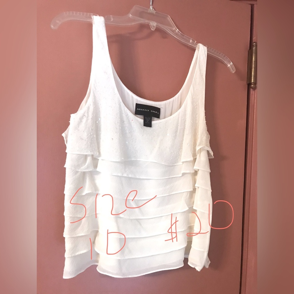 White sleeveless blouse